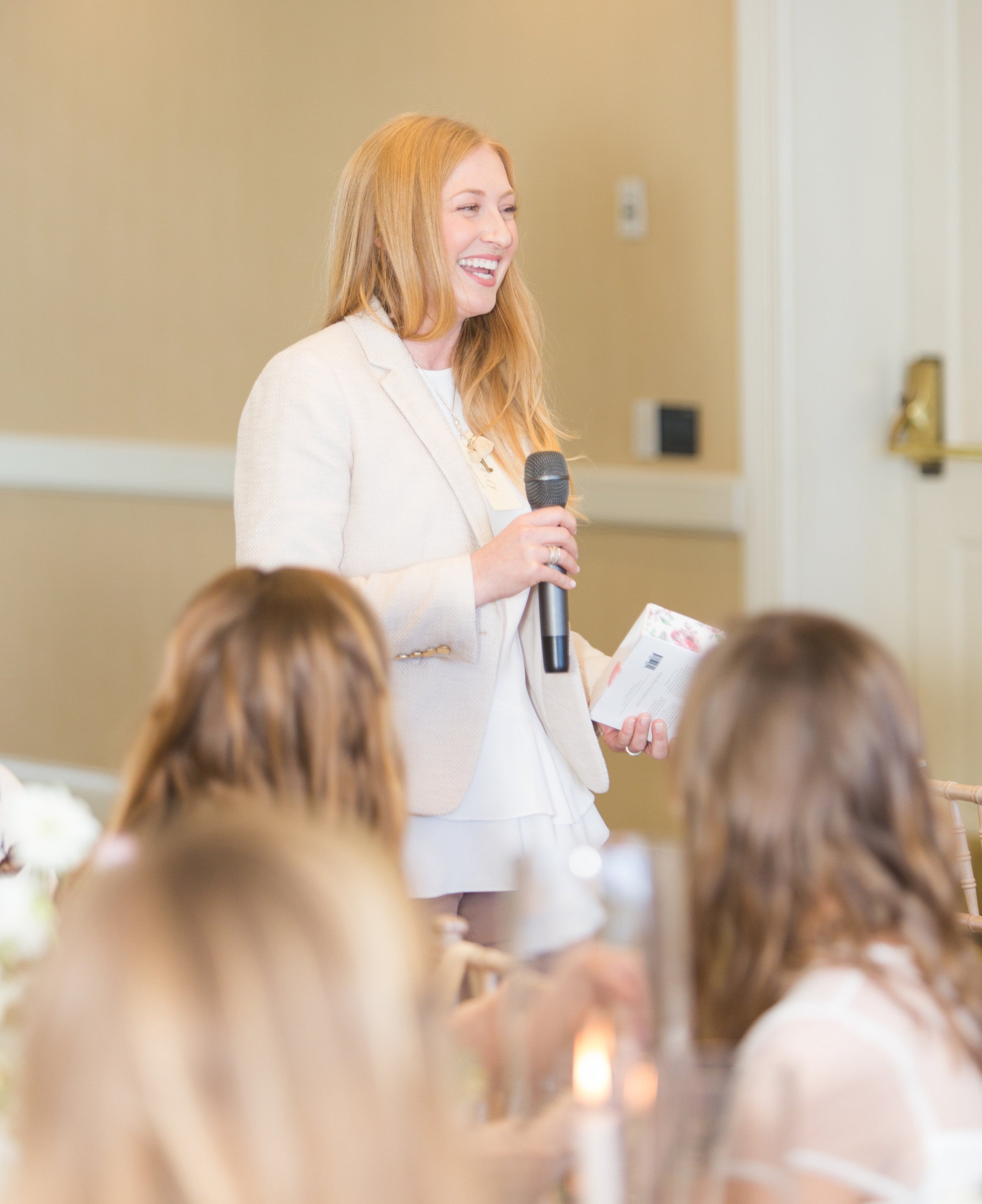 Lacey Haegen speaking at a leadership and business coaching event for entrepreneurs and nonprofit leaders