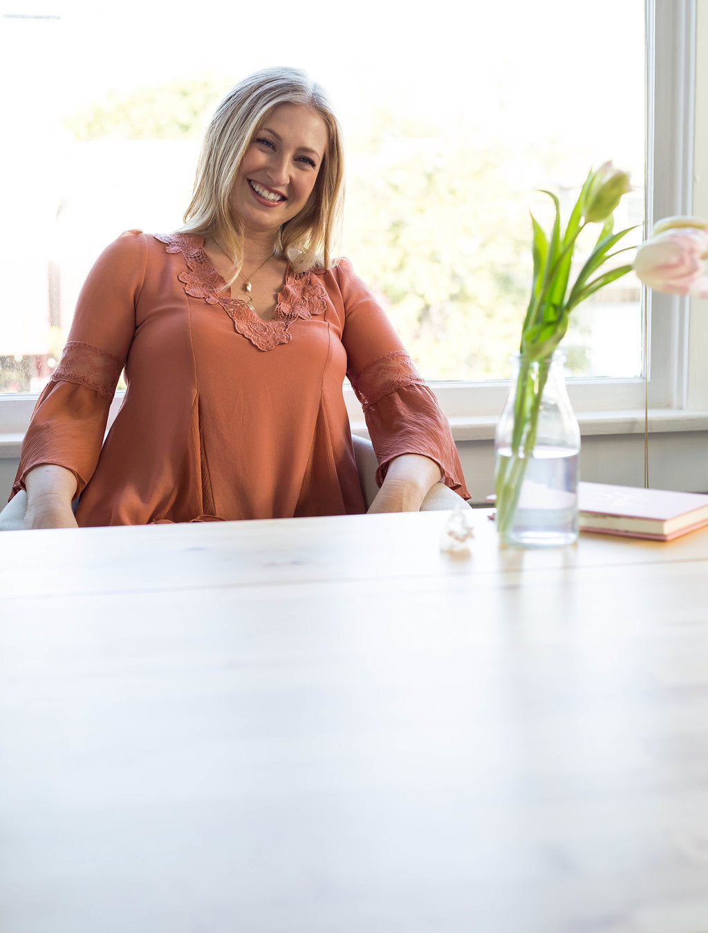 Portrait of business and leadership coach Lacey Haegen, founder of Flourish, providing executive coaching for entrepreneurs, CEOs, and nonprofit leaders.