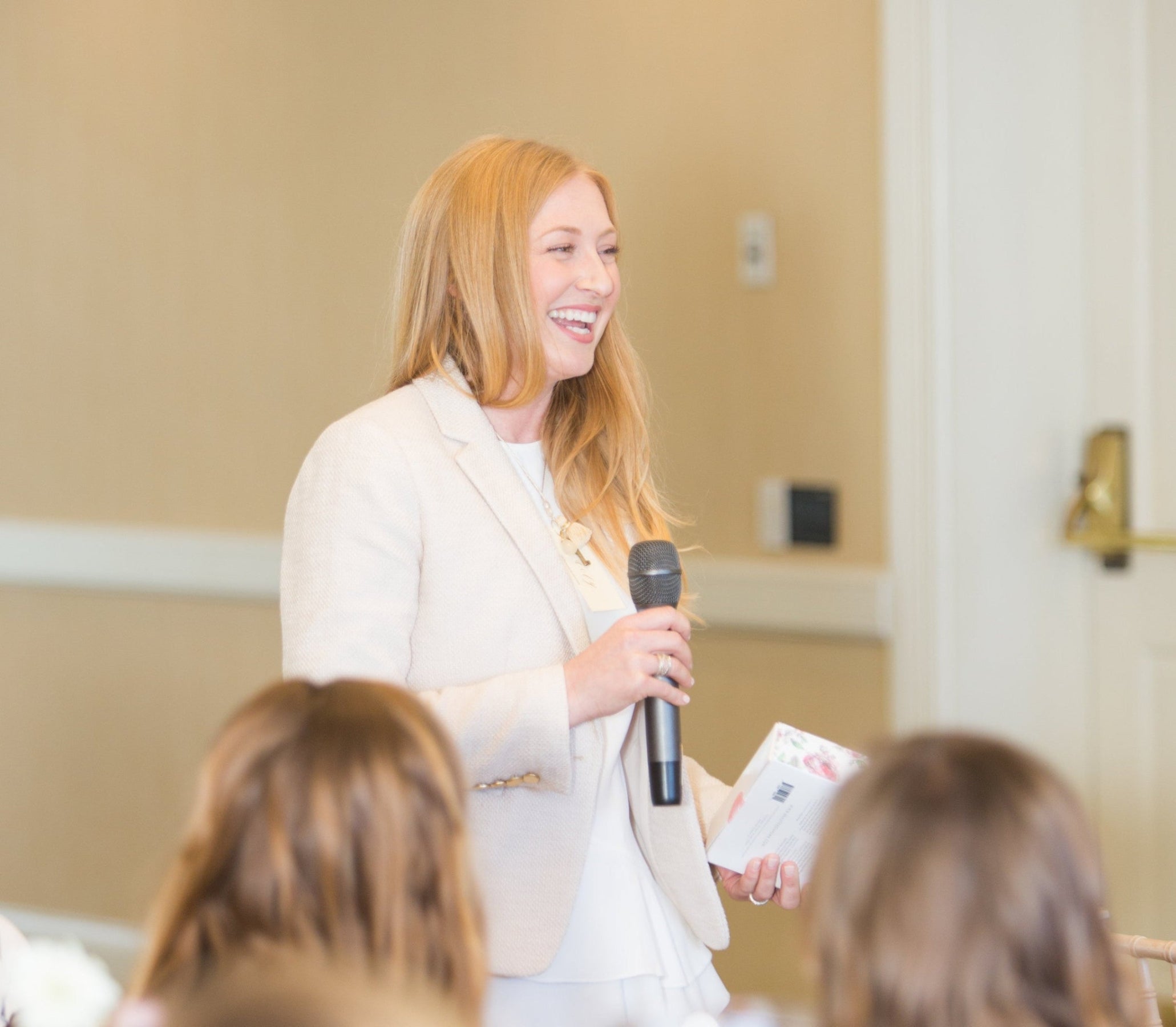 Lacey Haegen speaking at a leadership and business coaching event for entrepreneurs and nonprofit leaders